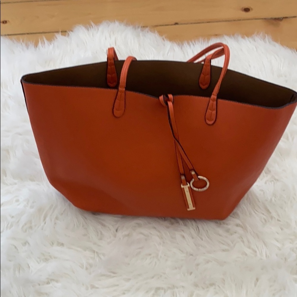 Orange and tan reversible tote